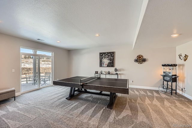 rec room featuring recessed lighting, carpet flooring, a textured ceiling, and baseboards