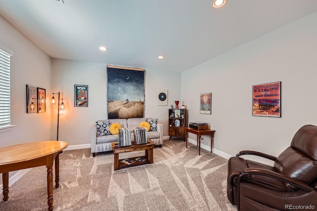 living area featuring baseboards, carpet flooring, and recessed lighting