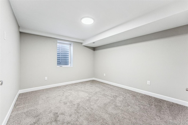 basement with carpet and baseboards