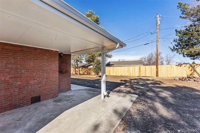 view of patio / terrace with fence