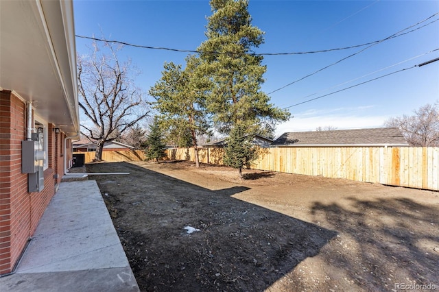 view of yard featuring a fenced backyard