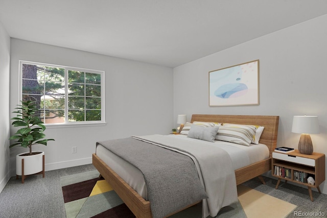 carpeted bedroom featuring baseboards