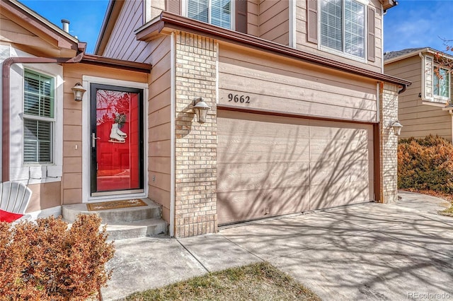 entrance to property with a garage