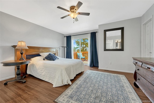 bedroom with dark wood-type flooring, ceiling fan, and access to exterior