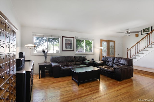 6584 S Clermont Ct, Centennial, CO 80121 - living room featuring light wood-type flooring, stairway, and a ceiling fan