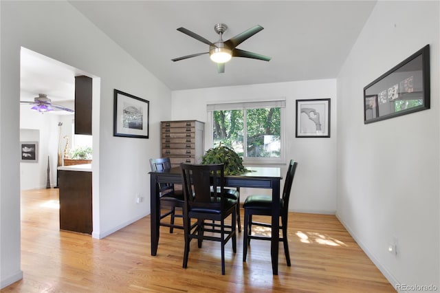 6584 S Clermont Ct, Centennial, CO 80121 - dining space with ceiling fan, lofted ceiling, and light wood-style flooring