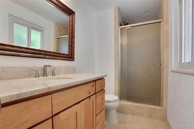 6584 S Clermont Ct, Centennial, CO 80121 - bathroom with vanity, a shower stall, plenty of natural light, and tile patterned flooring