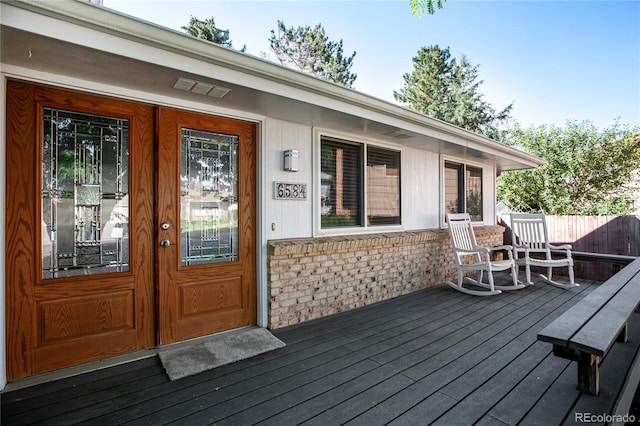 6584 S Clermont Ct, Centennial, CO 80121 - wooden terrace featuring french doors