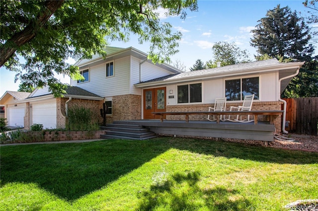6584 S Clermont Ct, Centennial, CO 80121 - split level home with brick siding, an attached garage, and a wooden deck