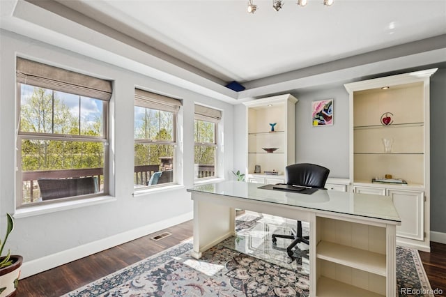 office with dark wood finished floors and baseboards
