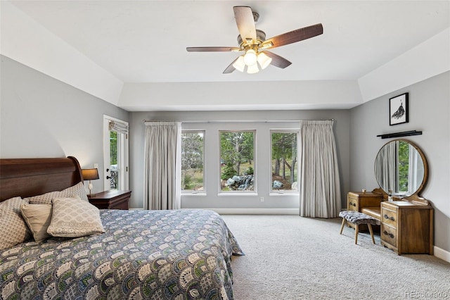 bedroom with carpet flooring, ceiling fan, and baseboards