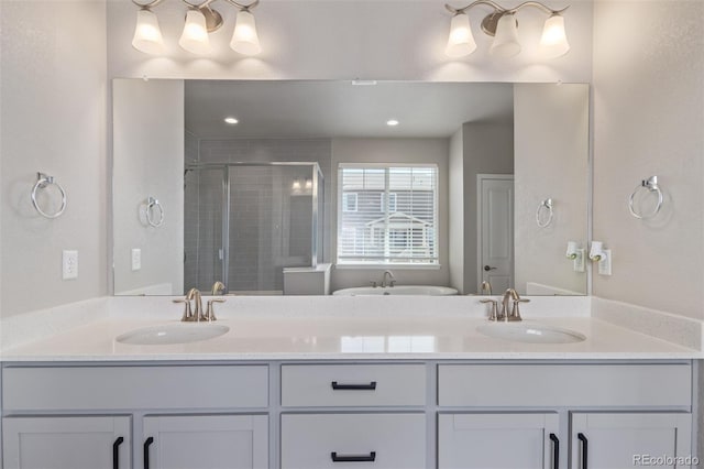 full bath with a shower stall and double vanity