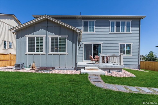 back of property with board and batten siding