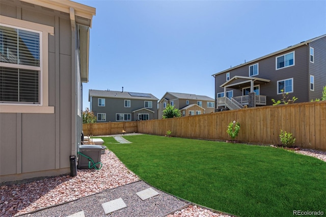 view of yard with a residential view