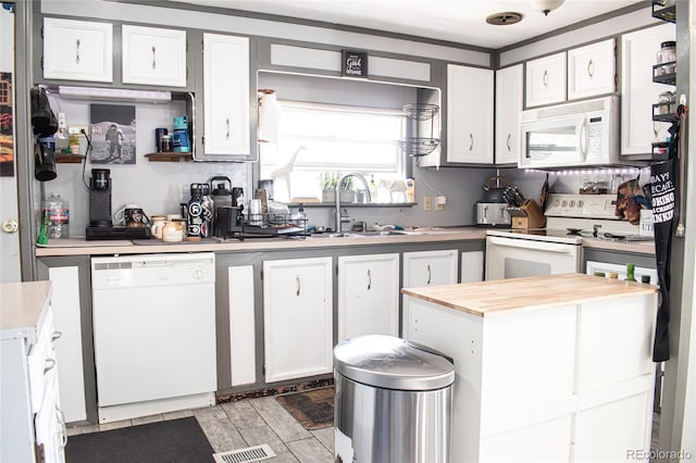 25500 US Highway 50, Cotopaxi, CO 81223 - kitchen featuring white appliances, butcher block countertops, and white cabinets