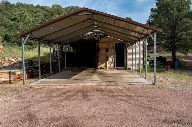 25500 US Highway 50, Cotopaxi, CO 81223 - view of vehicle parking with a detached carport and driveway