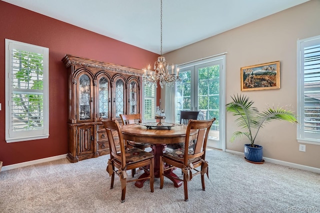 16644 Eolus Way, Broomfield, CO 80023 - dining space featuring light carpet and a chandelier