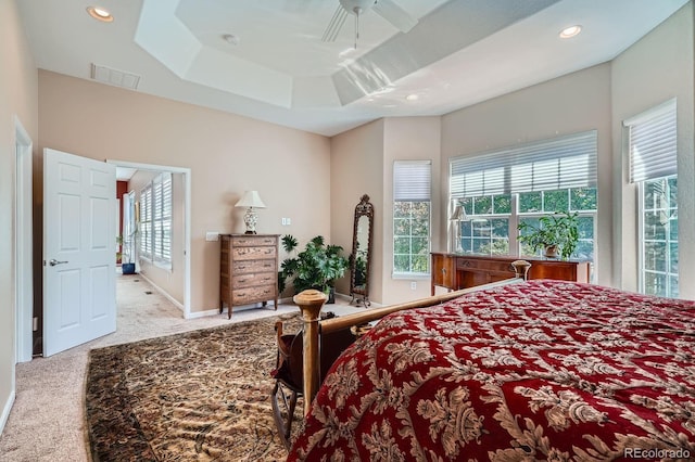 16644 Eolus Way, Broomfield, CO 80023 - bedroom featuring multiple windows, carpet floors, recessed lighting, a raised ceiling, and ceiling fan