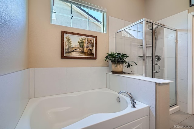 16644 Eolus Way, Broomfield, CO 80023 - bathroom featuring a bath and a shower stall