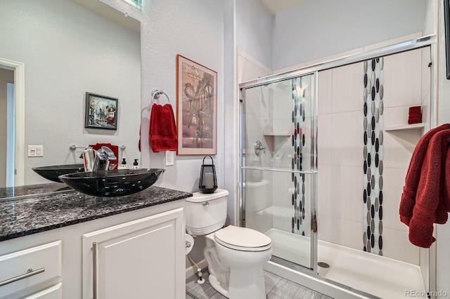 16644 Eolus Way, Broomfield, CO 80023 - full bath with a shower stall, vanity, and a textured wall