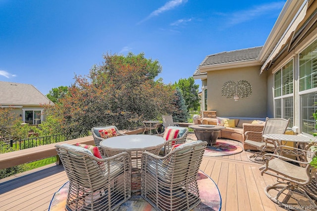16644 Eolus Way, Broomfield, CO 80023 - deck with an outdoor living space with a fire pit