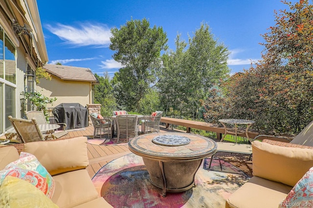 16644 Eolus Way, Broomfield, CO 80023 - view of patio / terrace featuring a grill, outdoor dining area, and an outdoor hangout area