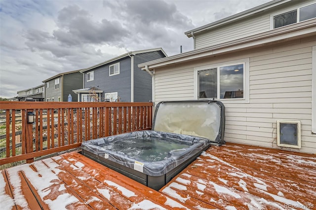 view of snow covered deck