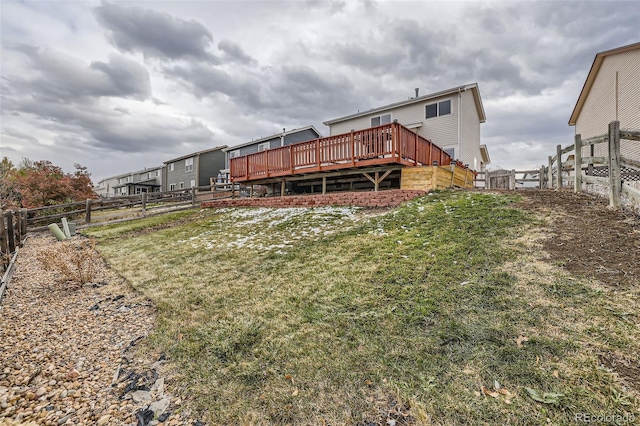 view of yard with a wooden deck