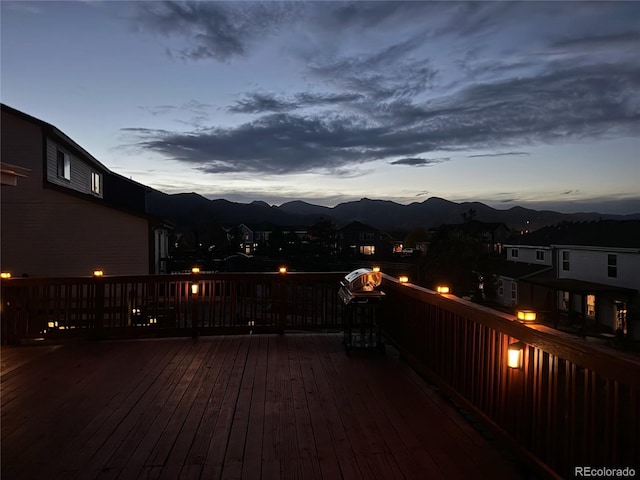 deck at dusk with a mountain view