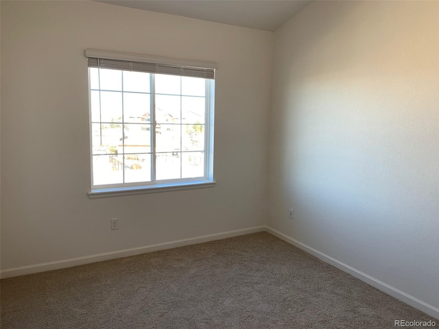 view of carpeted spare room