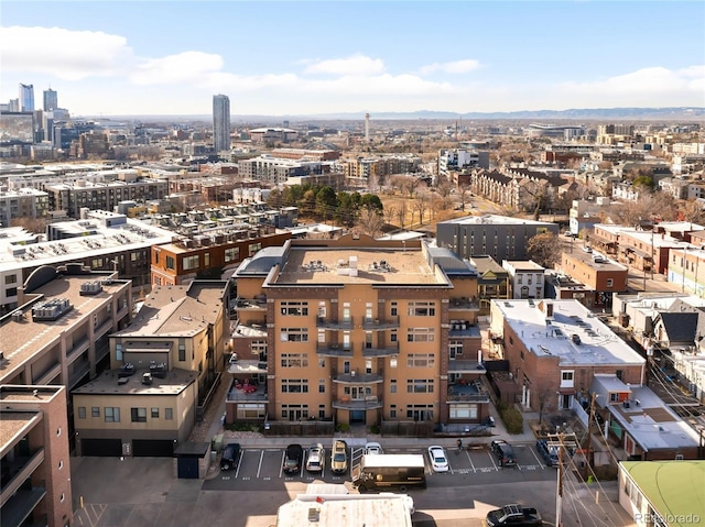 birds eye view of property with a view of city