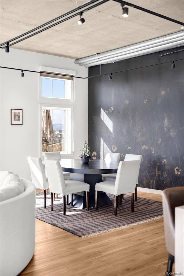 dining room with wood finished floors