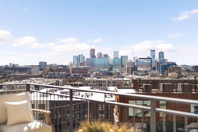 balcony featuring a city view