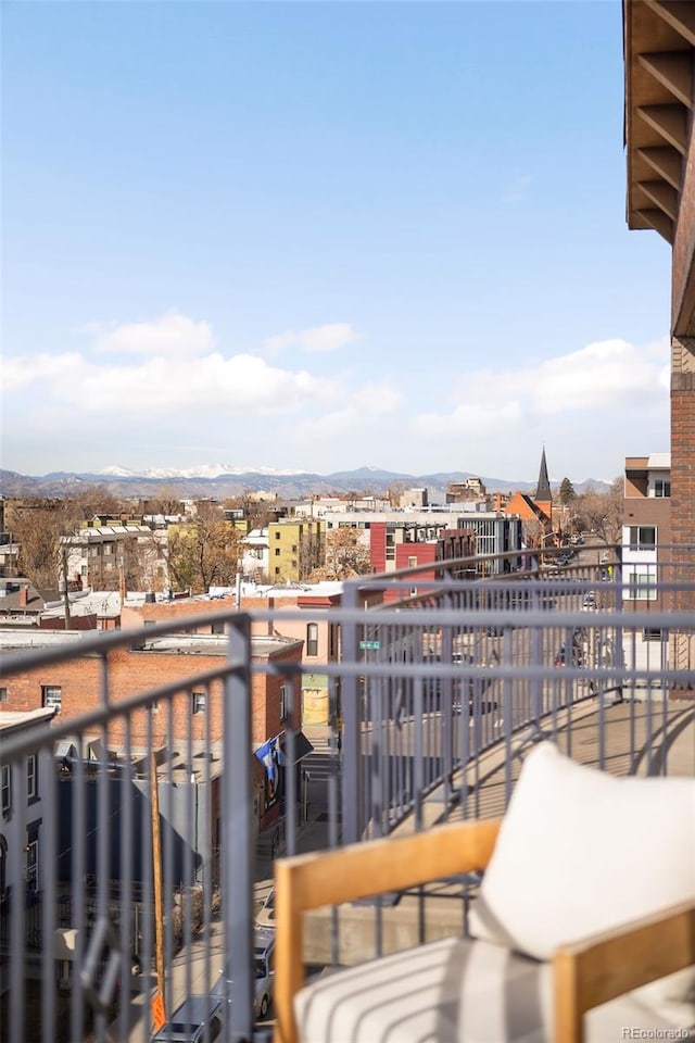 balcony featuring a mountain view