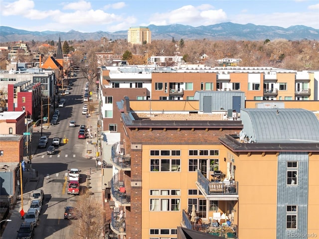 drone / aerial view featuring a mountain view