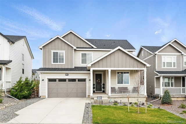 1101 E Witherspoon Dr, Elizabeth, CO 80107 - craftsman house featuring covered porch, an attached garage, driveway, a front yard, and board and batten siding