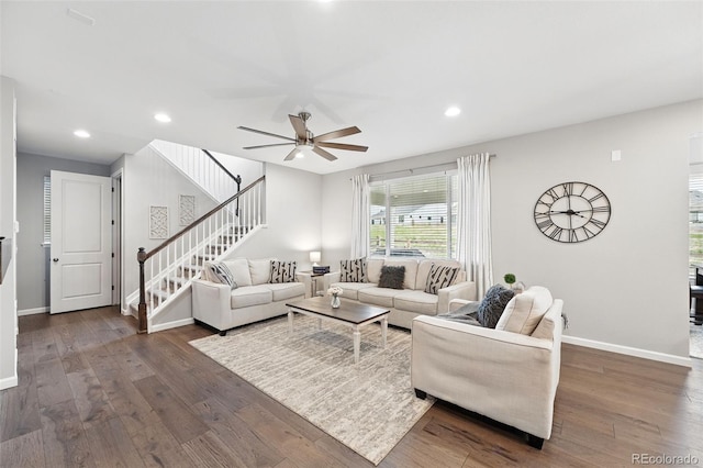 1101 E Witherspoon Dr, Elizabeth, CO 80107 - living room featuring stairs, baseboards, dark wood-style floors, and recessed lighting