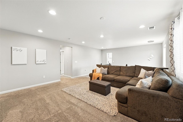 1101 E Witherspoon Dr, Elizabeth, CO 80107 - living area with light colored carpet, baseboards, visible vents, and recessed lighting