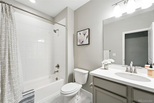 1101 E Witherspoon Dr, Elizabeth, CO 80107 - full bathroom featuring shower / tub combo, toilet, tile patterned flooring, vanity, and a textured wall