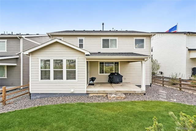 1101 E Witherspoon Dr, Elizabeth, CO 80107 - back of property with a fenced backyard and a lawn