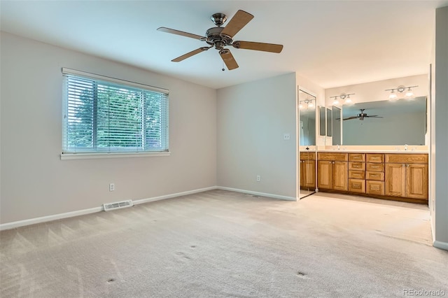 4780 W 102nd Pl, Westminster, CO 80031 - unfurnished bedroom with light colored carpet and ensuite bath