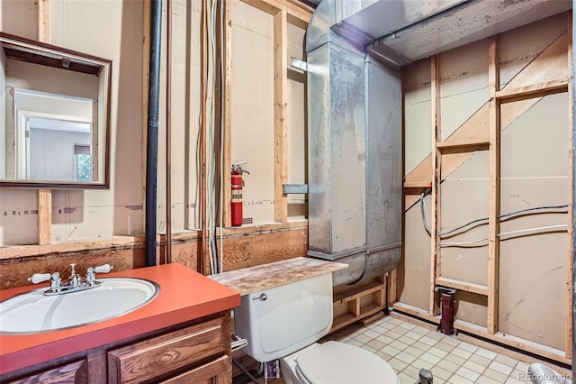 4780 W 102nd Pl, Westminster, CO 80031 - half bathroom featuring vanity and tile patterned flooring