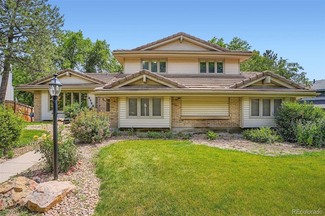 4780 W 102nd Pl, Westminster, CO 80031 - view of front of home with a front yard and a tile roof