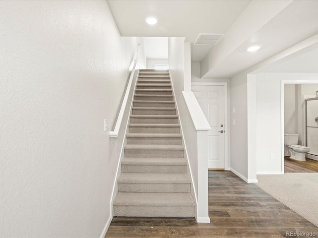 4761 Talley St, Morrison, CO 80465 - stairs featuring visible vents, baseboards, recessed lighting, and wood finished floors