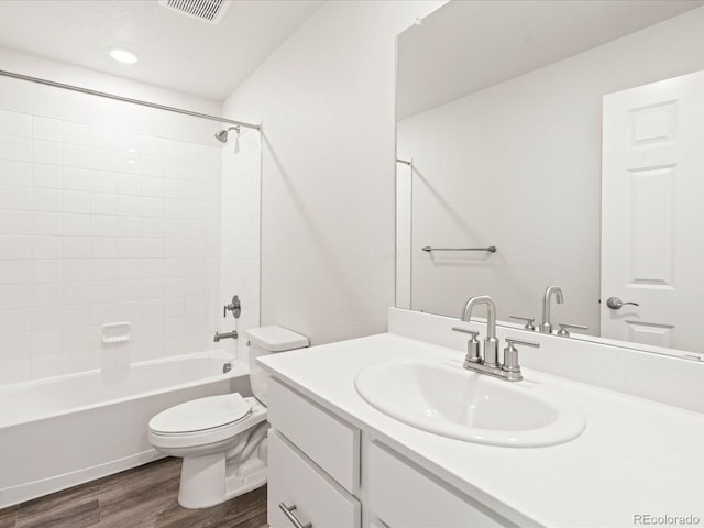 4761 Talley St, Morrison, CO 80465 - bathroom featuring bathtub / shower combination, vanity, visible vents, toilet, and wood finished floors