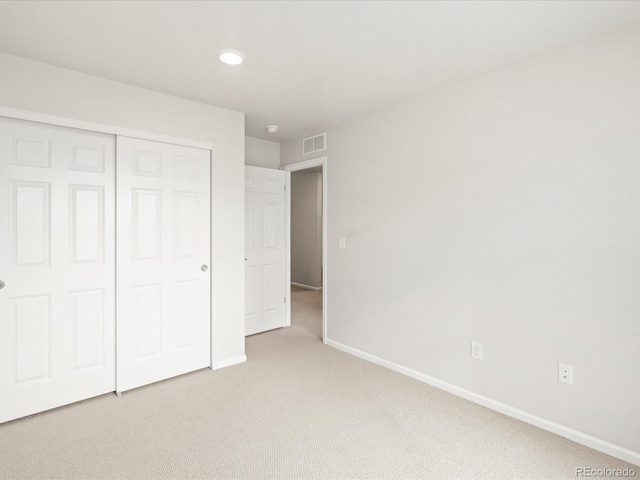 4761 Talley St, Morrison, CO 80465 - unfurnished bedroom featuring visible vents, baseboards, a closet, and light colored carpet