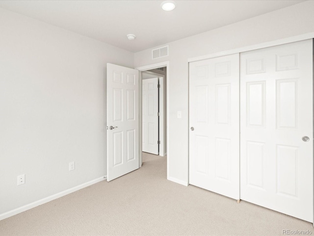4761 Talley St, Morrison, CO 80465 - unfurnished bedroom with light carpet, visible vents, baseboards, and a closet