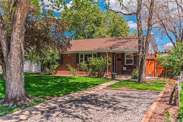 ranch-style house with brick siding and covered porch