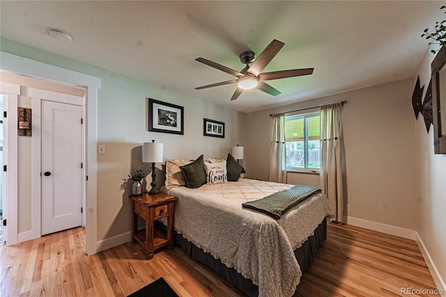 2274 S Cherry St, Denver, CO 80222 - bedroom featuring light wood-style flooring, baseboards, and ceiling fan