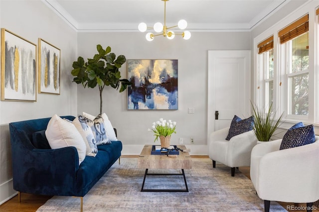 living area with an inviting chandelier, crown molding, and wood finished floors